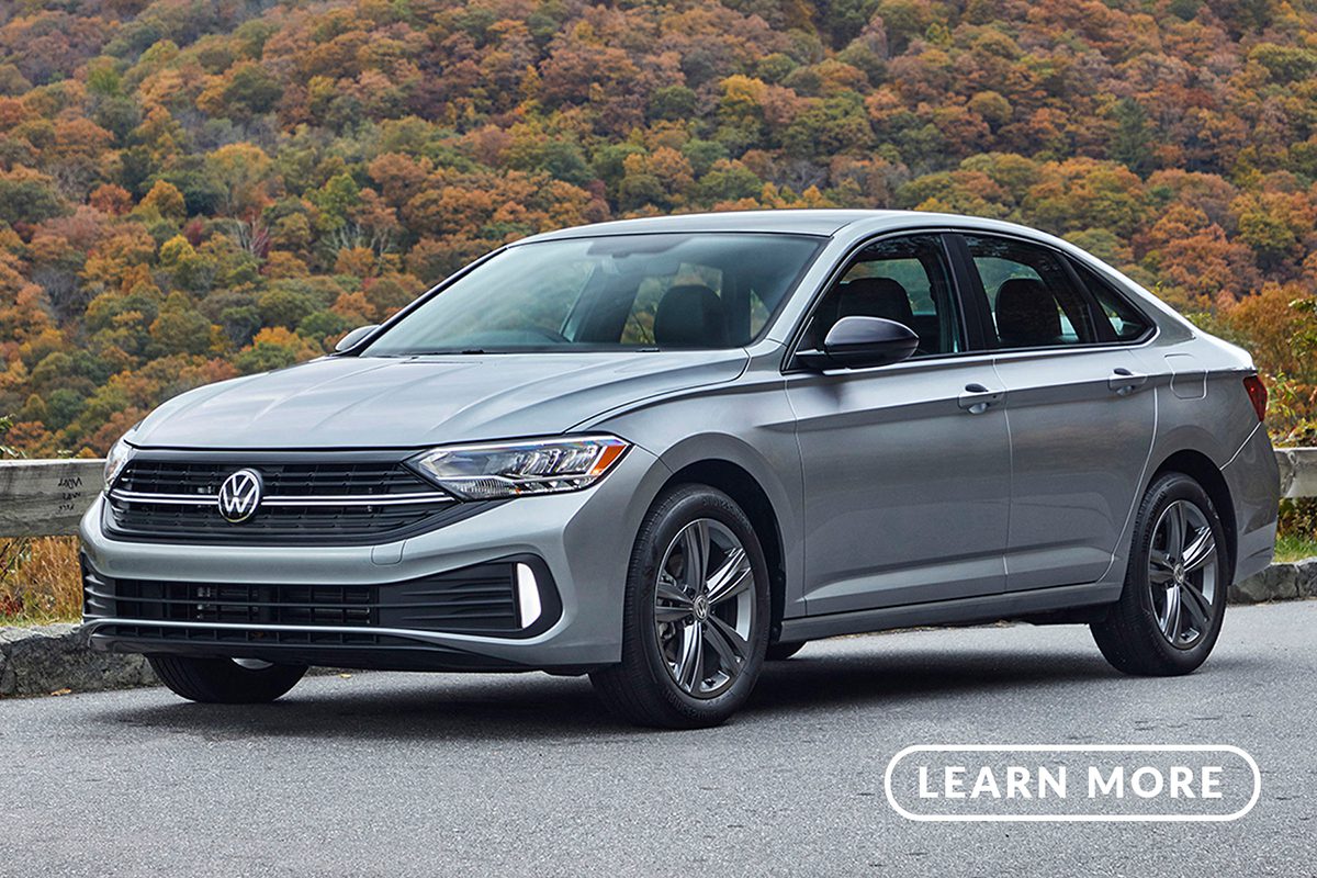 The 2019 volkswagen jetta is parked on a road.